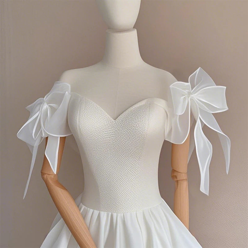 Manches amovibles mariée à nœud organza