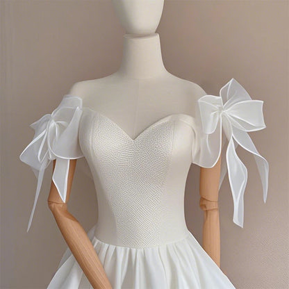 Manches amovibles mariée à nœud organza
