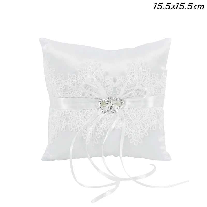 Coussin d'alliance dentelle blanche et nœud satin