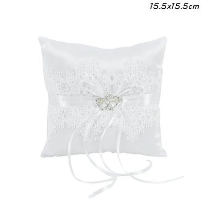 Coussin d'alliance dentelle blanche et nœud satin
