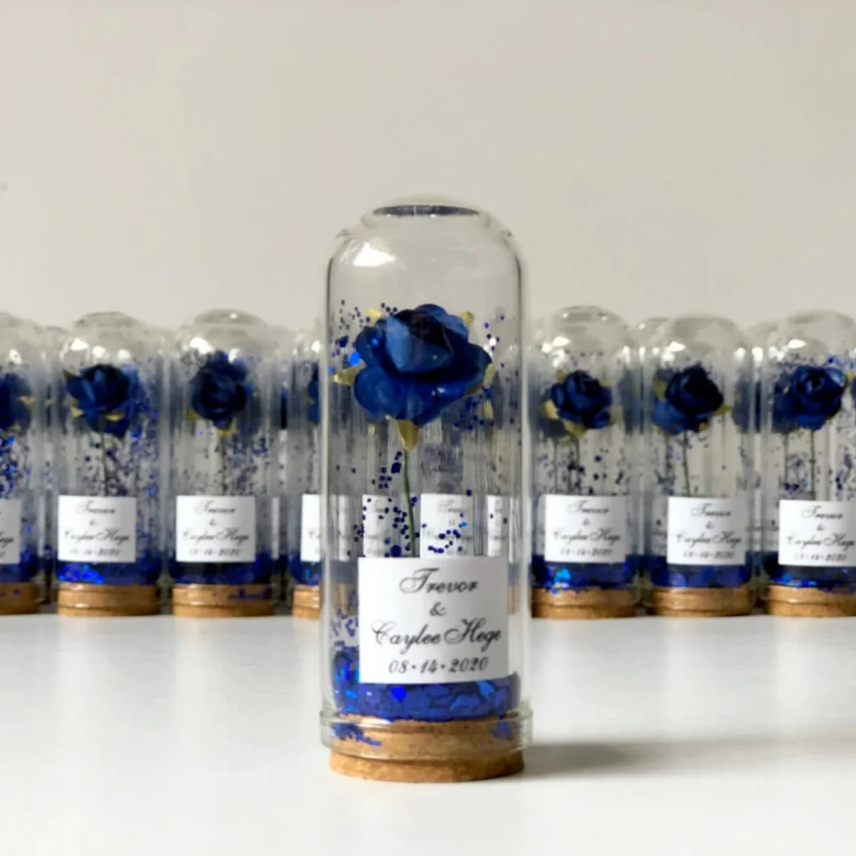 Cadeau invité mariage rose sous cloche