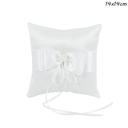 Coussin d'alliance dentelle blanche et nœud satin