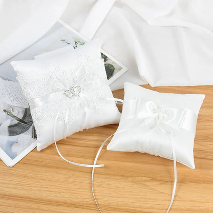 Coussin d'alliance dentelle blanche et nœud satin